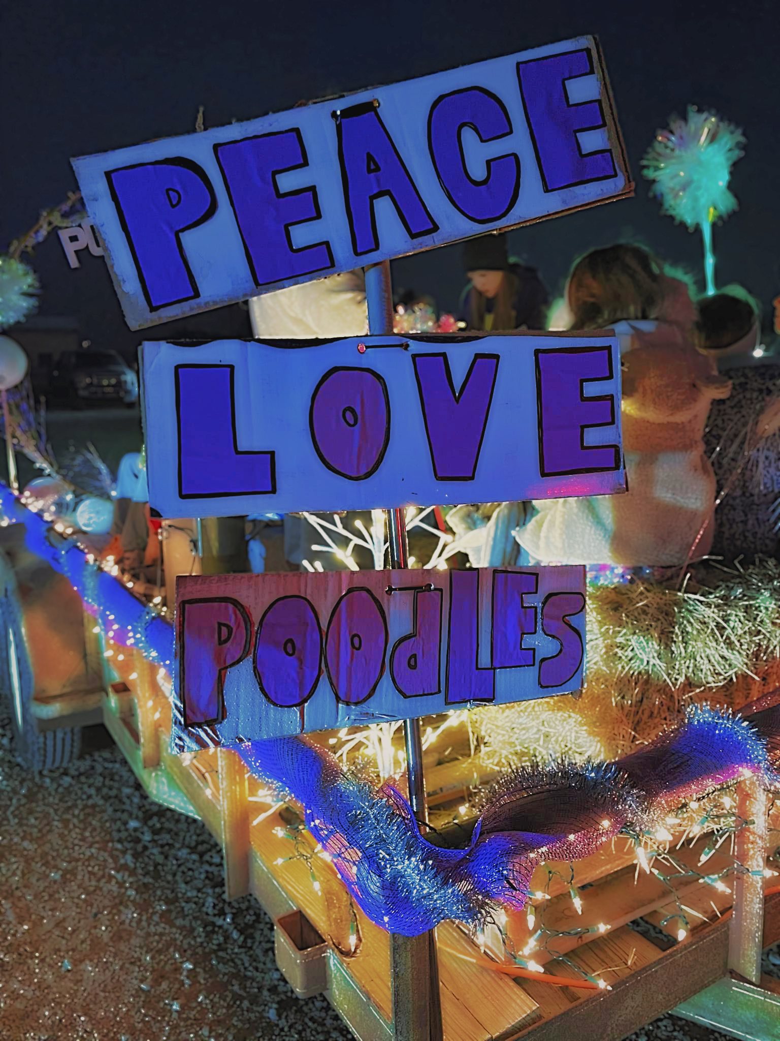 Peace Love Poodles float in a community parade